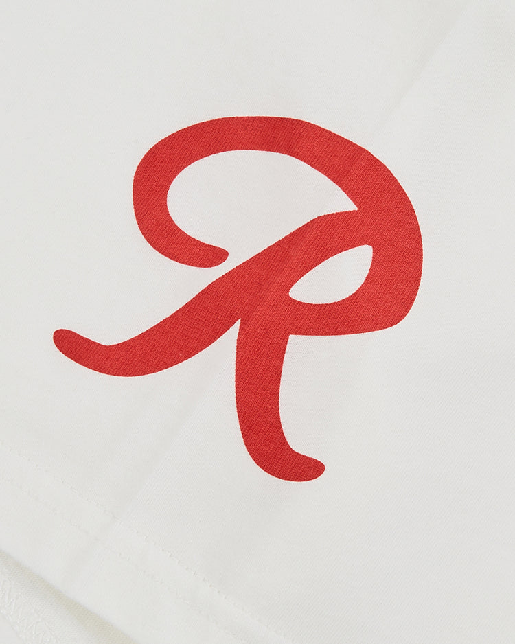 A close-up of the Seattle Rainiers Short Sleeve Graphic Tee by Ebbets Field, showcasing a bold red 