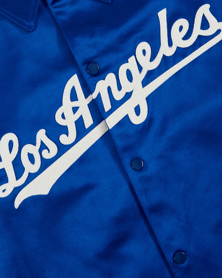 Close-up of the EFF Los Angeles Dodgers 1962 Satin Windbreaker Jacket, a blue button-up featuring 