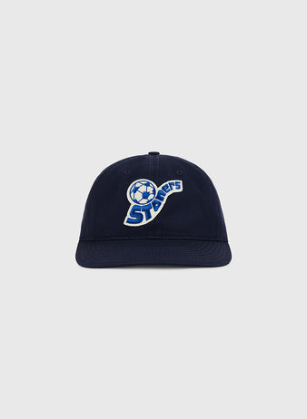 The Pennsylvania Stoners Cotton Twill Ballcap by Ebbets Field features a soccer ball graphic and “Sockers” embroidered in blue and white on the front, shown against a light gray background.