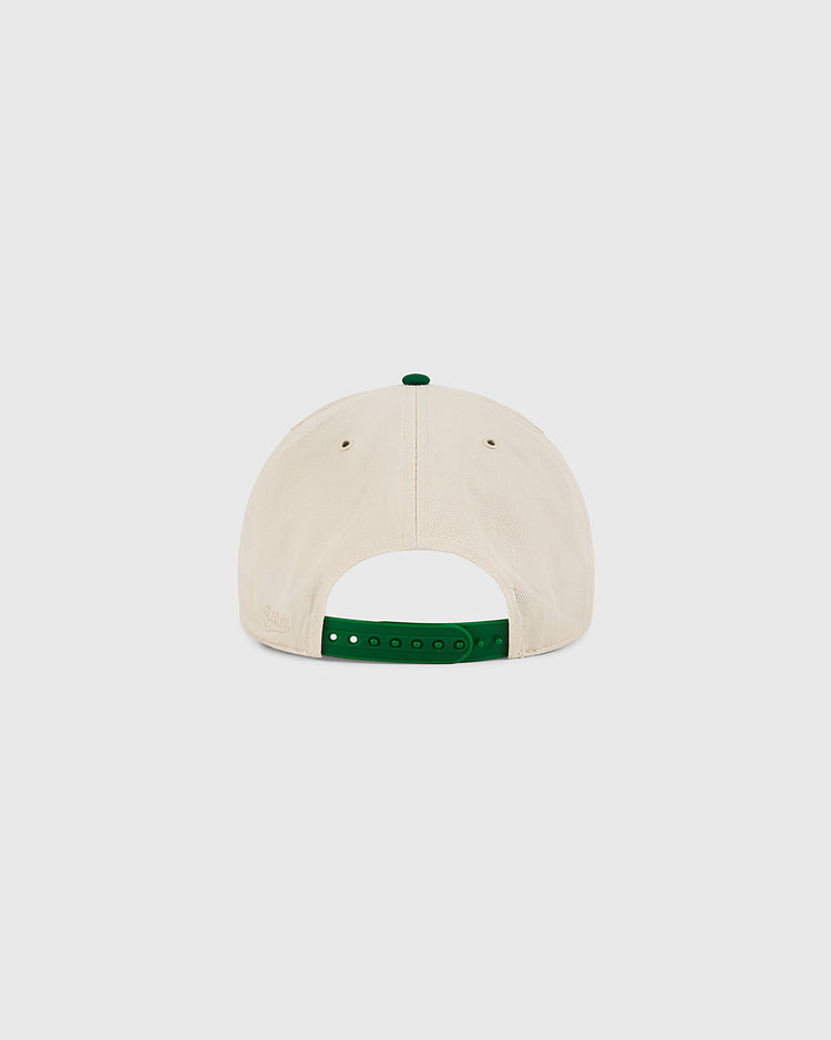 The Ebbets Field New York Cosmos A-Frame Cotton Twill Ballcap is a beige retro snapback with a green adjustable closure and top button, shown from the back on a light gray background—a classic Cosmos-inspired design.