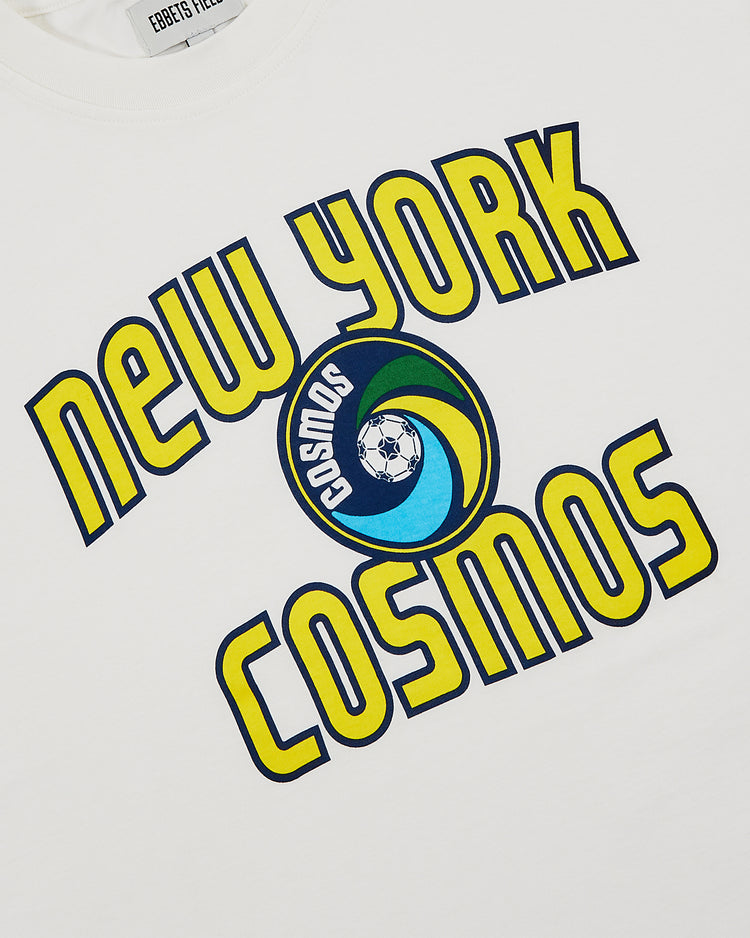 Show your love for the legendary team in the Ebbets Field New York Cosmos Short Sleeve Graphic T-Shirt, a vintage tee with “Cosmos” lettering and classic logo—a true Pelé-era tribute for fans.