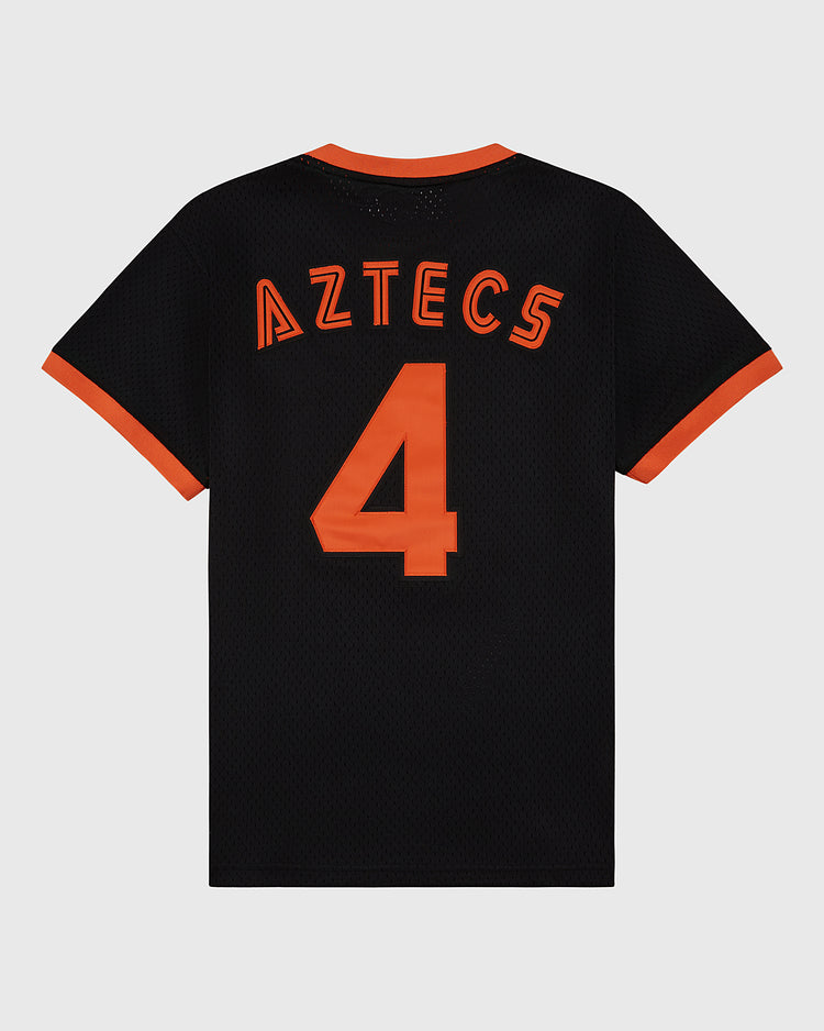 The Ebbets Field Los Angeles Aztecs Mesh Soccer Jersey features a black mesh build with orange trim and 