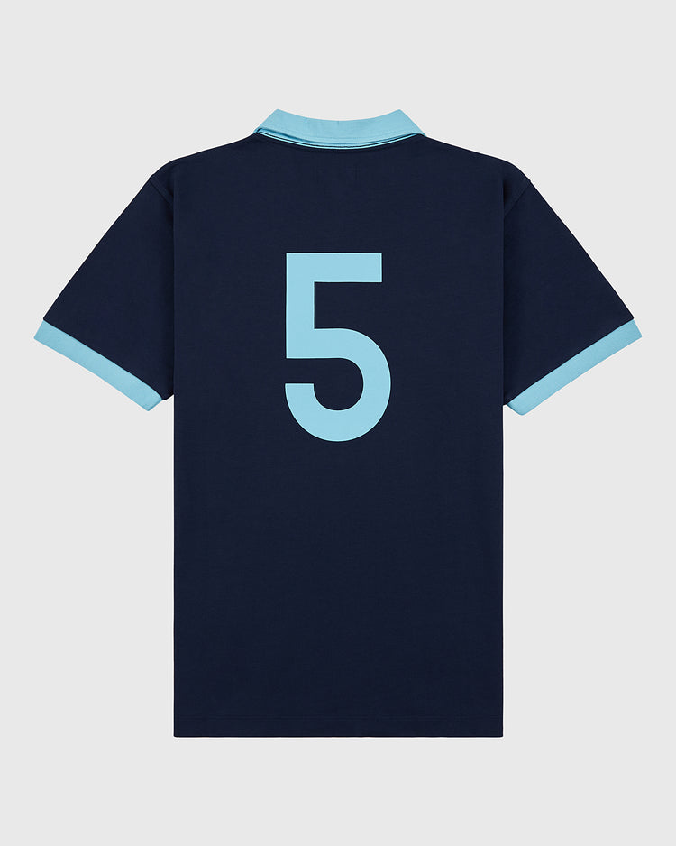 Show your Chicago Cats spirit in this Ebbets Field Chicago Cats Vintage Collar Soccer Jersey—navy cotton with light blue collar, sleeve cuffs, and a bold number 5 on the back, inspired by classic American Soccer League style.