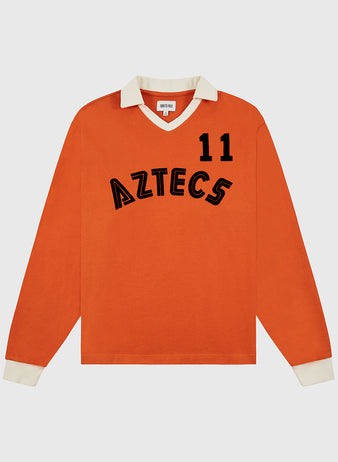 The Ebbets Field Los Angeles Aztecs Vintage Soccer Goalie Jersey features orange long sleeves, cream cuffs and collar, plus 
