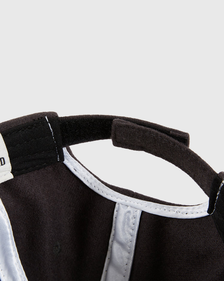 Close-up of the inside of the Ebbets Field Osaka Tigers 1940 Wool Ballcap (Youth Size), highlighting the soft fabric and adjustable Velcro strap, reminiscent of classic Japanese baseball styles.