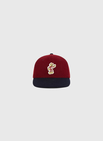 The Ebbets Field Red Reddy K 1940 Authentic Ballcap is a maroon cap with a navy brim and a vibrant embroidered cartoon character on the front, displayed on a plain light gray background.