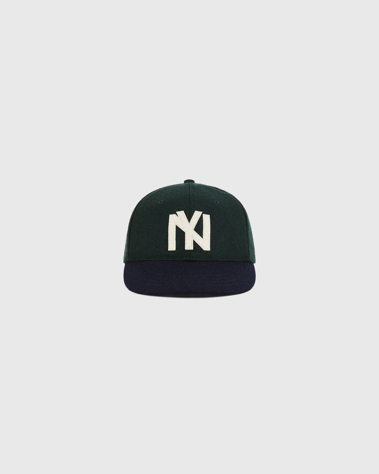 The Ebbets Field BK Eagles 1935 Authentic Ballcap is dark green with a navy brim and large white embroidered 