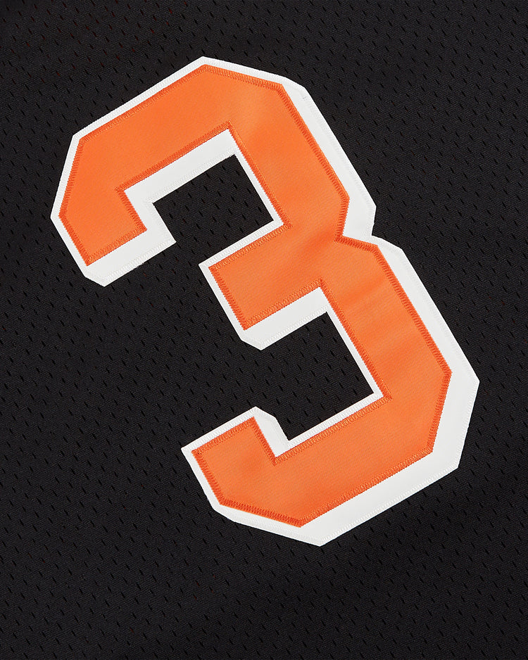 An orange and white number 3 is sewn onto black mesh, echoing a classic style on the Ebbets Field Detroit Cougars Mesh Soccer Jersey.