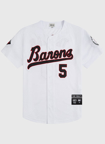 The Ebbets Field Birmingham Barons Frank Thomas Button Up Mesh Jersey is a white mesh baseball jersey featuring 