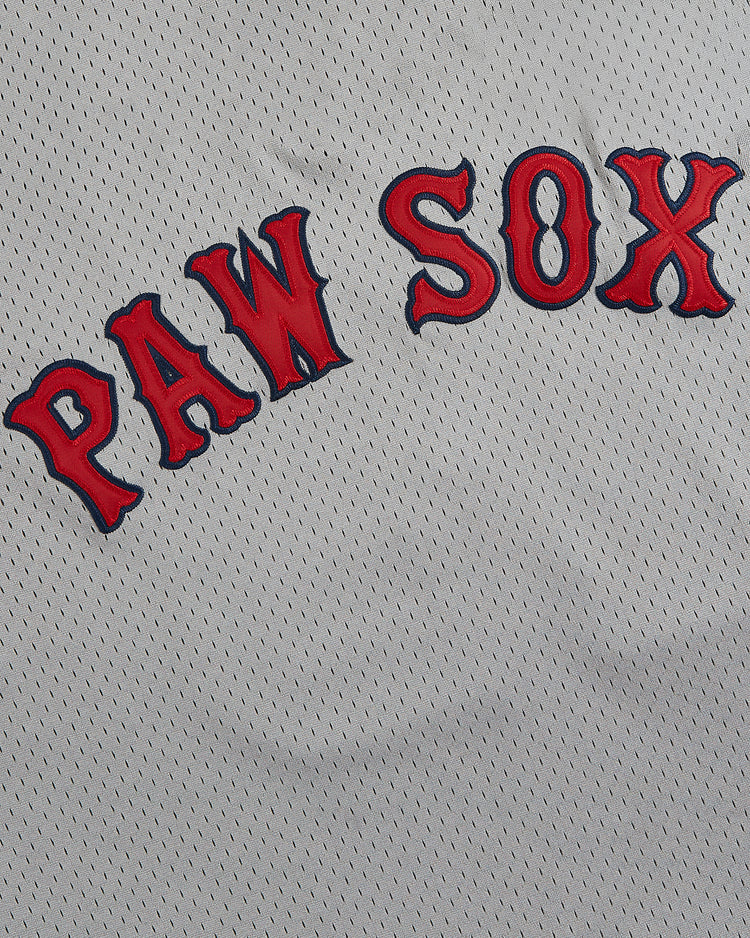 A close-up of the Wade Boggs Pawtucket Red Sox Mesh V-Neck Jersey by Ebbets Field, featuring white mesh fabric and 