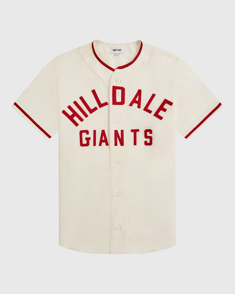 Introducing the Hilldale Giants 1929 Wool Home Authentic Jersey by Ebbets Field—a cream-colored, authentic wool jersey featuring red trim and buttons. HILLDALE GIANTS is emblazoned in bold red letters across the front, echoing the legendary uniforms worn by the Hilldale Giants during their historic 1929 Negro League baseball season.