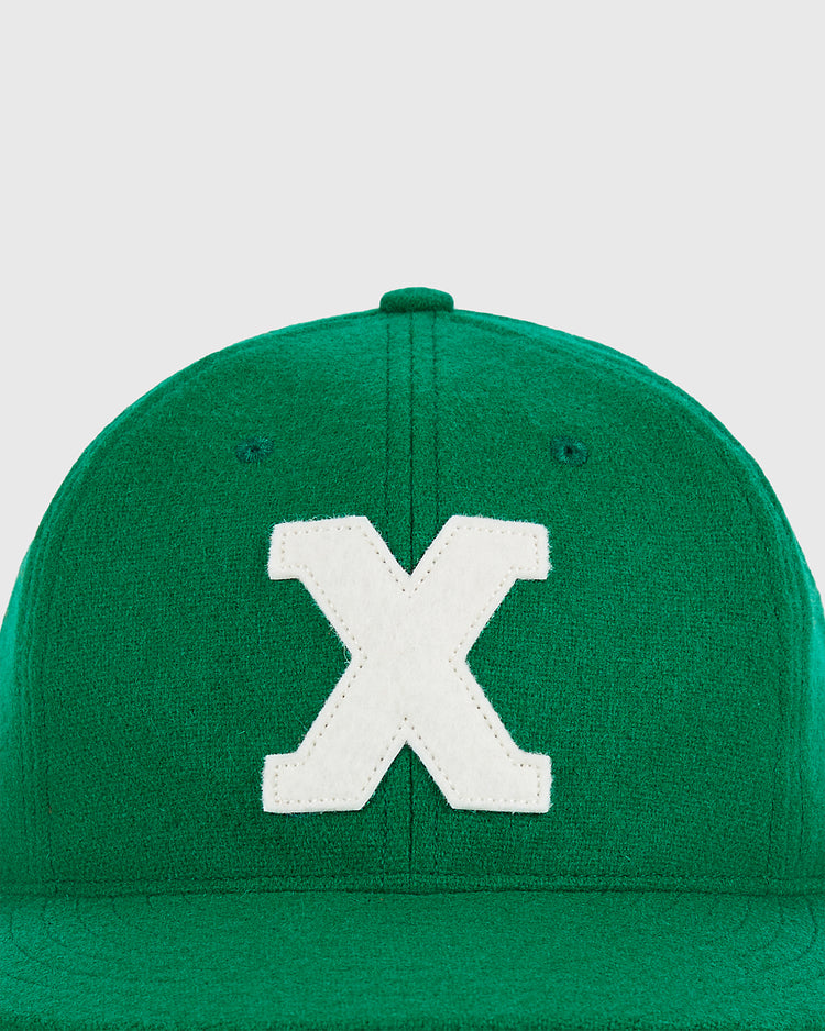 The Ebbets Field Xalapa Chileros 1963 Authentic Wool Ballcap, featuring a large white letter 
