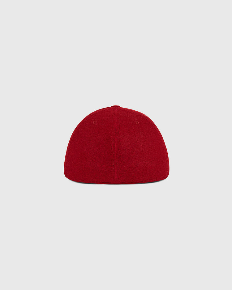 The Escogido Leones 1955 Authentic Wool Ballcap by Ebbets Field, displayed from the back against a light gray background.