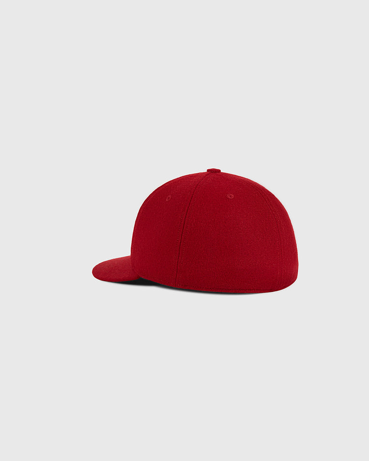 The Ebbets Field Escogido Leones 1955 Authentic Wool Ballcap is displayed from the back and side against a light gray background.