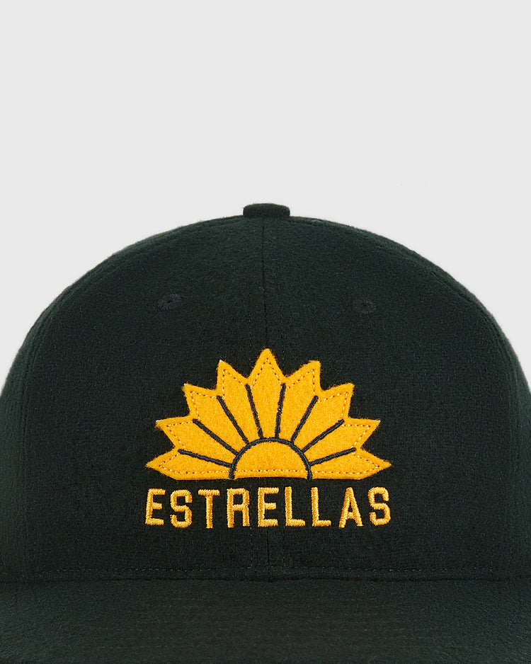 A black wool baseball cap by Ebbets Field, featuring a yellow embroidered stylized sun and 