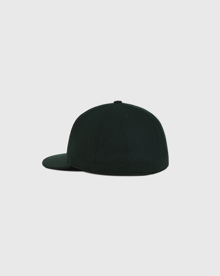 A back view of the Estrellas Orientales 1953 Authentic Wool Ballcap by Ebbets Field, featuring a plain black design with a flat brim, shown against a light gray background and free of logos or visible designs.