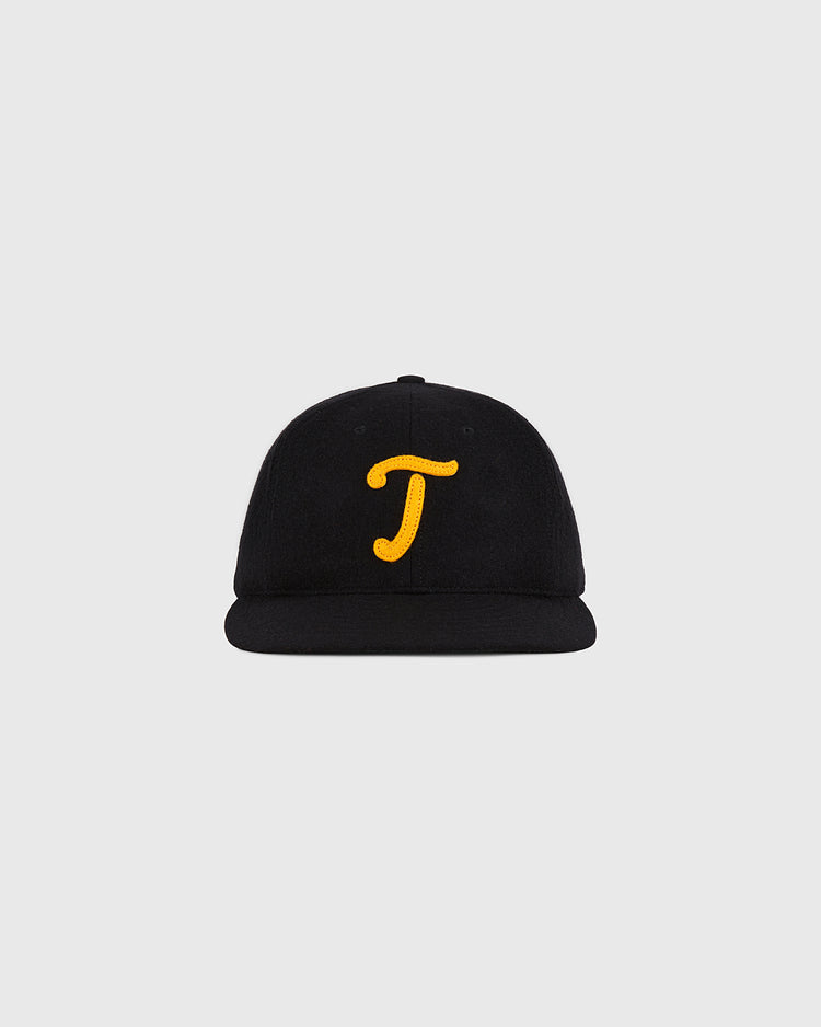 A Mexico City Tigres 1959 Authentic Wool Ballcap by Ebbets Field, featuring a yellow letter J embroidered on the front, is displayed against a plain light gray background.