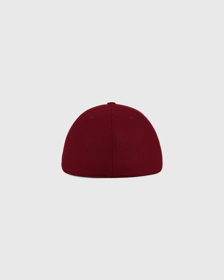 A Cordoba Cafeteros 1958 Authentic Wool Ballcap by Ebbets Field is shown from the back against a light grey background. The cap features a plain maroon design with no visible logos, patterns, or straps.