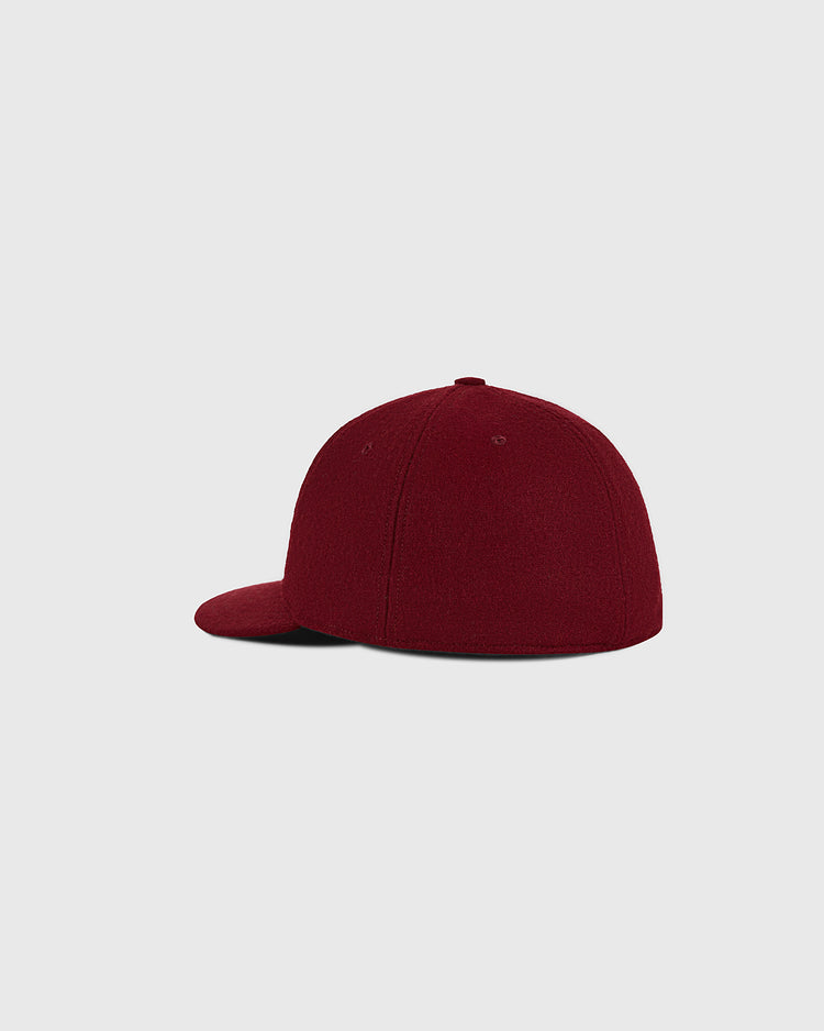 The Cordoba Cafeteros 1958 Authentic Wool Ballcap by Ebbets Field is displayed on a light gray background, photographed from the back left side.
