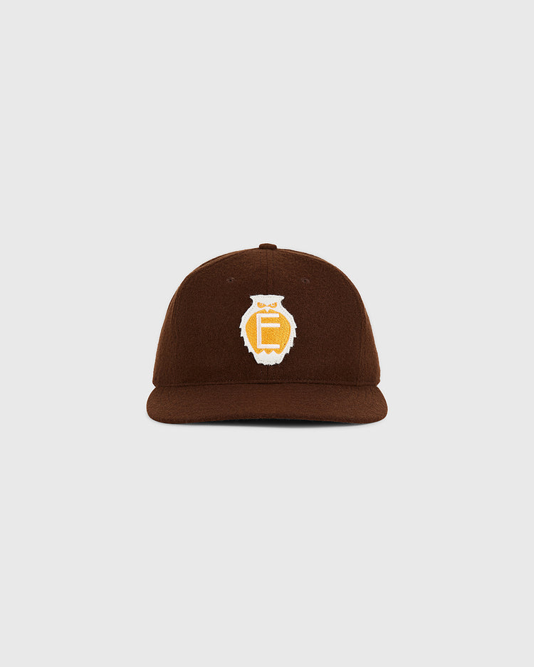 The Ebbets Field Tecolotes 1935 Authentic Wool Ballcap, featuring a yellow and white embroidered owl logo on the front, is displayed against a plain light grey background.