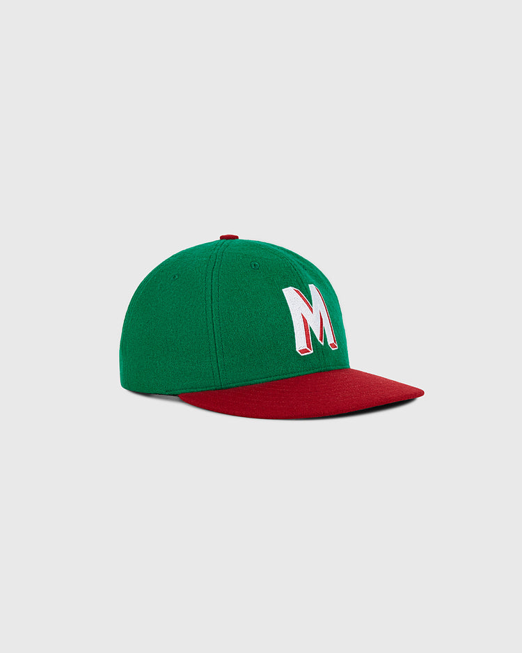 A Mexico City Reds 1943 Authentic Wool Ballcap by Ebbets Field, featuring a green crown, red brim, and a large white embroidered 