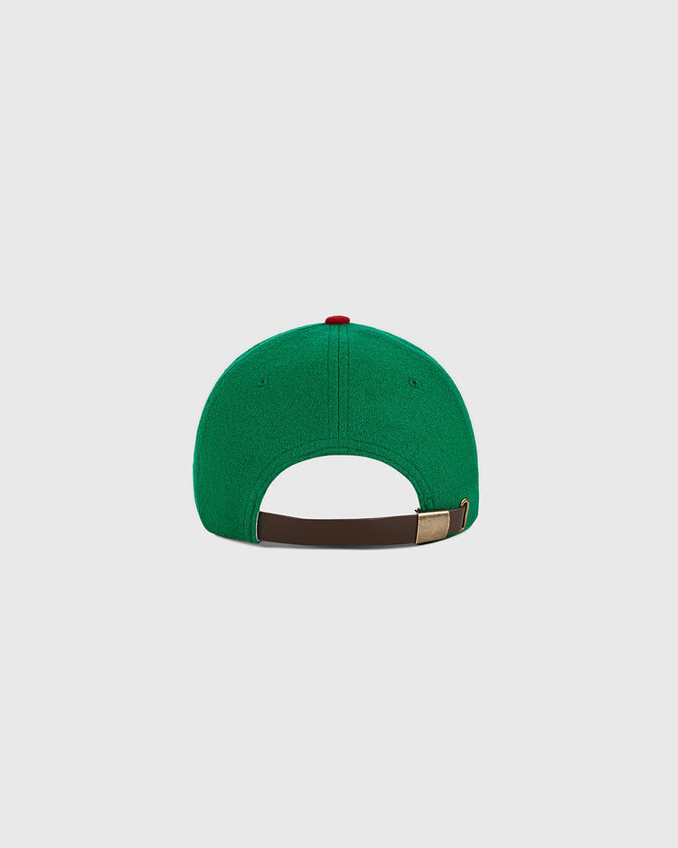 An Ebbets Field Mexico City Reds 1943 Authentic Wool Ballcap in green, shown from the back, features a brown adjustable strap with a metal clasp, set against a plain white background.