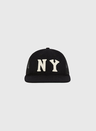 The New York Black Yankees Mesh Trucker Ballcap by Ebbets Field features large white 