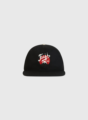 The Ebbets Field Fuji Athletic Club Cotton Twill Ballcap is a black flat-brim cap crafted from cotton twill, showcasing a red and white embroidered Fuji Athletic Club logo with a mountain graphic on the front—a homage to Japanese American baseball heritage. Set against a plain light gray background.