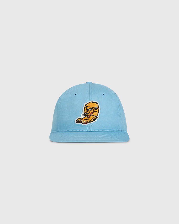 The Ebbets Field Nishitetsu Lions 1971 Cotton Twill Ballcap is a light blue cap with an embroidered yellow tiger eating pizza on the front, offering a playful take on the classic design and shown against a plain white background.