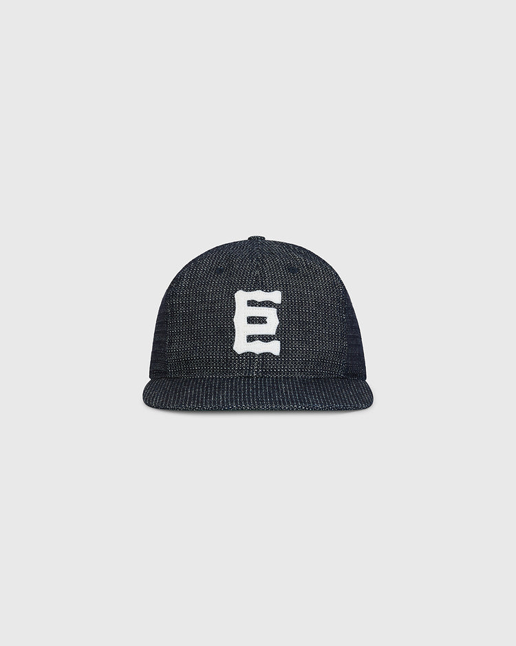Ebbets Field Tokyo Giants 1940 Japanese Indigo Dobby Cotton Ballcap in dark blue with a textured, dotted pattern and a white embroidered character on the front.