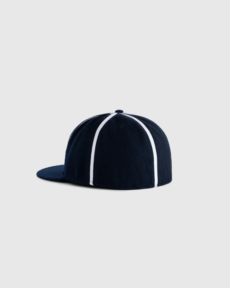 The EFF Sacramento Solons 1945 Authentic Wool Softbrim Ballcap features classic navy wool with white stripes, shown from the back and side on a light gray background, perfectly recreating the vintage PCL team hat style.