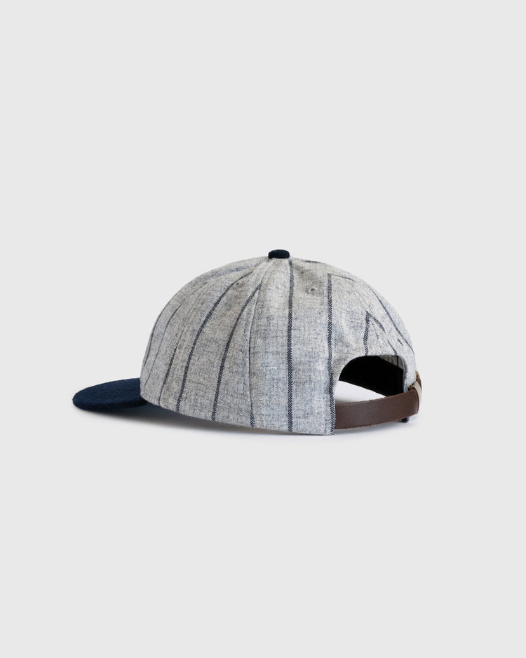 The Chicago American Giants 1914 Authentic Wool 8-Panel Softbrim Ballcap by EFF features a gray pinstriped crown, navy blue brim, and brown adjustable strap, displayed on a plain white background.