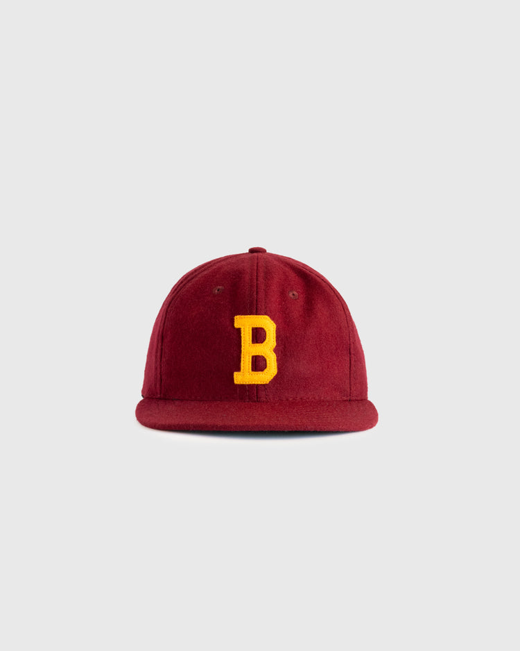 The EFF Brooklyn College 1959 Authentic Wool Ballcap features a maroon design with an authentic yellow felt B logo on the front, shown against a plain light gray background.