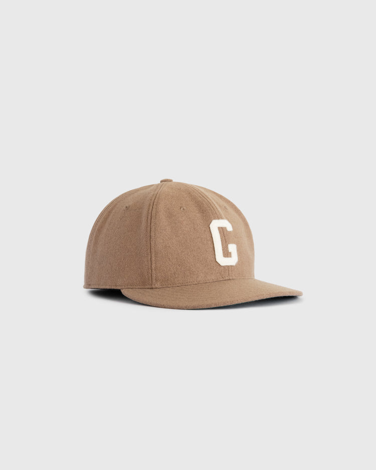 The Homestead Grays G Wool Ballcap by EFF is a brown vintage cap with a curved brim and a white embroidered letter G on the front, evoking classic Negro League memorabilia, shown against a plain light background.