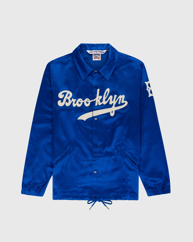 The EFF Brooklyn Dodgers 1945 Satin Windbreaker Jacket is a blue satin jacket with white text, inspired by the legendary Brooklyn Dodgers.