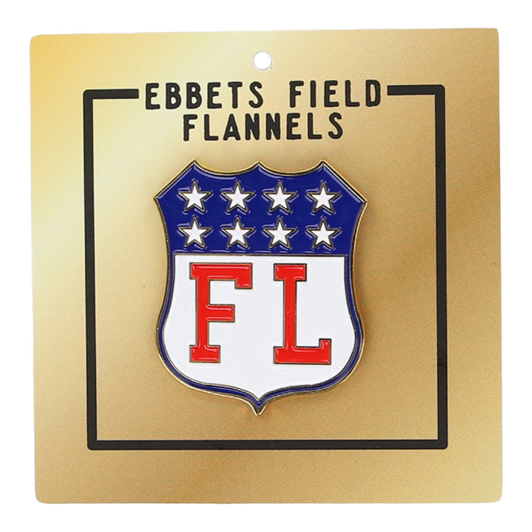 A gold card features a shield pin with six white stars and red FL, inspired by the Limited Edition Newark Peppers 1915 Vintage Ballcap. Above, “EBBETS FIELD FLANNELS” highlights the classic style of this Ebbets Field Flannels product.