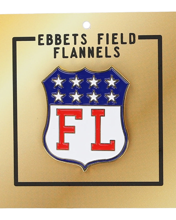 A gold card features a shield pin with six white stars and red FL, inspired by the Limited Edition Newark Peppers 1915 Vintage Ballcap. Above, “EBBETS FIELD FLANNELS” highlights the classic style of this Ebbets Field Flannels product.