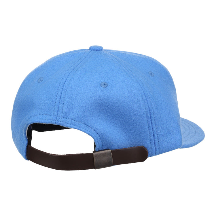 The EFF Columbia Blue Wool Vintage Ballcap is shown from the back, featuring a brown adjustable strap with metal clasp. This classic wool ballcap has a rounded crown and visible stitching, and is made in the USA.