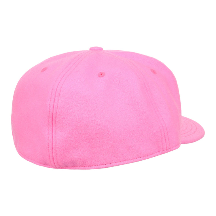 The EFF Pink Wool Vintage Ballcap, made in the USA, is shown from the back with a rounded crown, visible stitching, no adjustable strap or logo—showcasing classic craftsmanship.