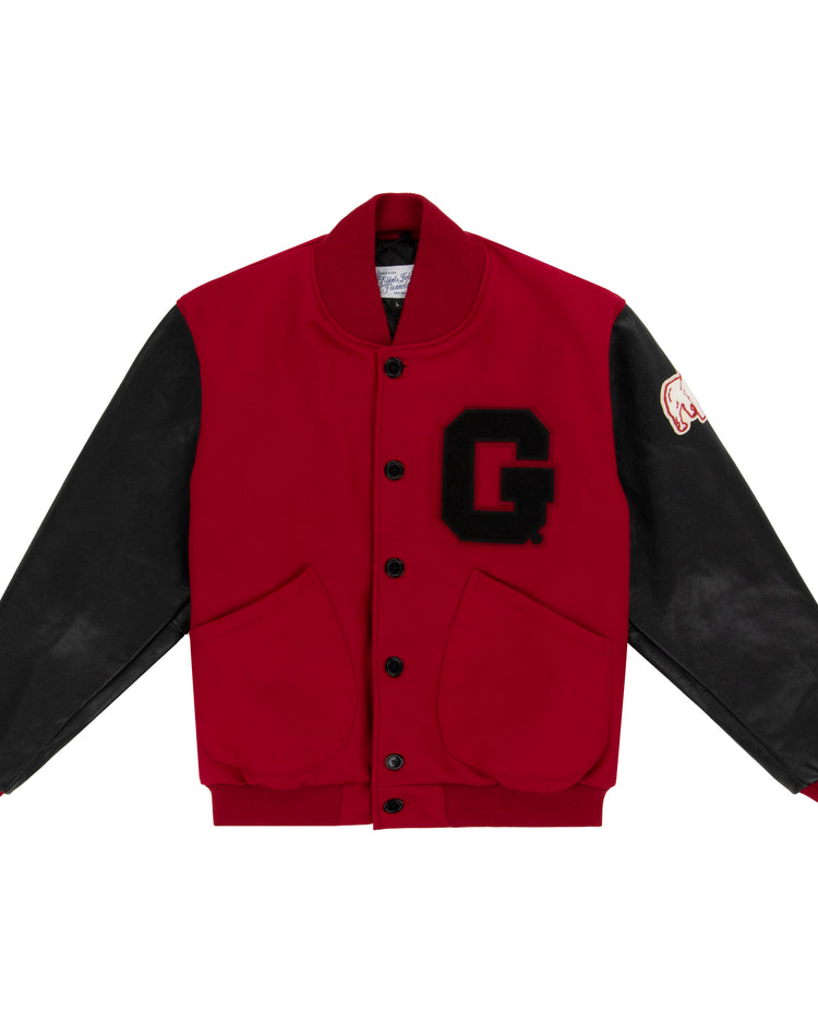 The EFF University of Georgia 1939 Authentic Jacket features a red body, black leather sleeves, black buttons, two front pockets, a large black G patch on the chest, and red ribbed cuffs and waistband for a classic collegiate look.