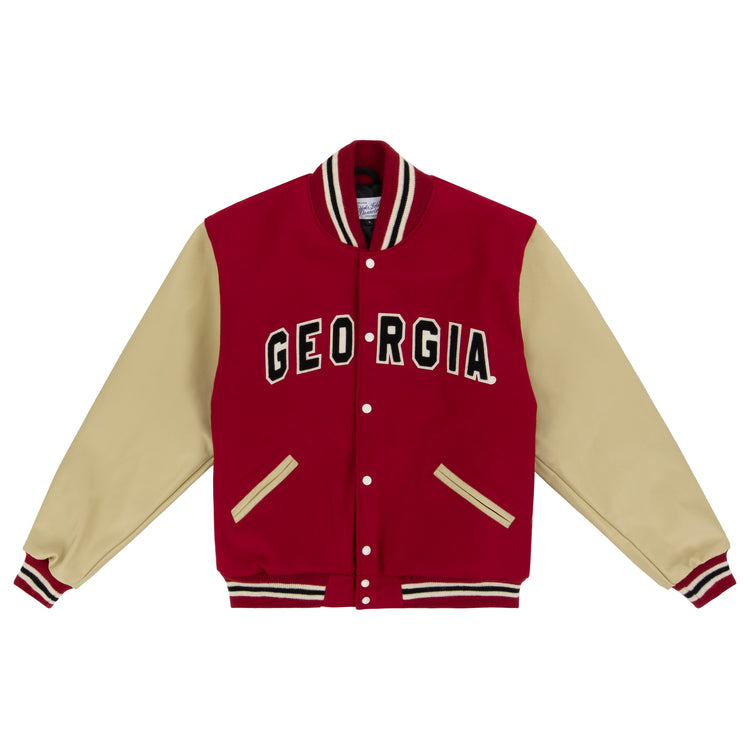 The EFF University of Georgia 1966 Authentic Jacket features a red body, beige sleeves, and striped details. GEORGIA is boldly displayed in black and white across the chest, echoing the iconic 1966 varsity style.