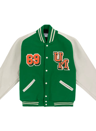The EFF University of Miami 1969 Authentic Jacket features green body, white sleeves, striped cuffs and collar, snap buttons, and orange “69” and UM patches on the chest—perfect for a classic Miami varsity look.