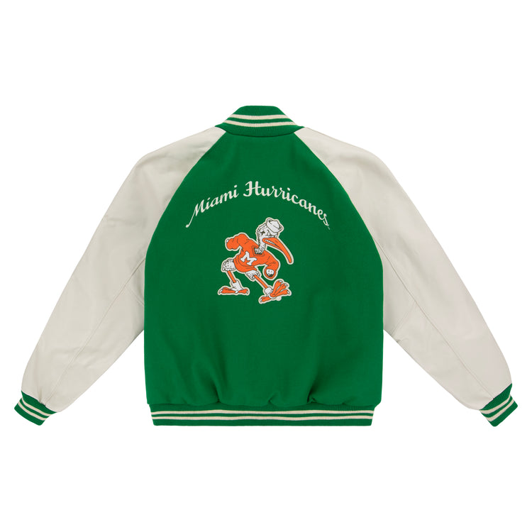 Show your Hurricane pride with the EFF University of Miami 1969 Authentic Jacket—green and white, featuring Miami Hurricanes above the ibis mascot in an orange sweater with a white M.