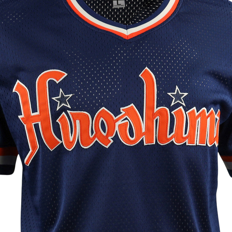 The EFF Hiroshima Carp EFF DNA Replica V-Neck Mesh Jersey is a navy blue vintage mesh jersey with Hiroshima in bold orange and white across the chest—ideal for passionate Hiroshima Carp fans.