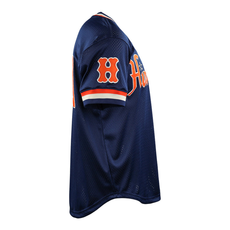 The EFF Hiroshima Carp DNA Replica V-Neck Mesh Jersey is shown from a side angle, featuring navy blue mesh, orange and white sleeve trim, an orange H patch, and partial team text on the chest.