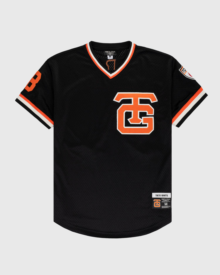 The EFF Tokyo Giants Mesh V-Neck Baseball Jersey features vintage-inspired black mesh with orange and white trim, a bold TG logo on the chest, number 8 on the left sleeve, and a team patch near the bottom hem.