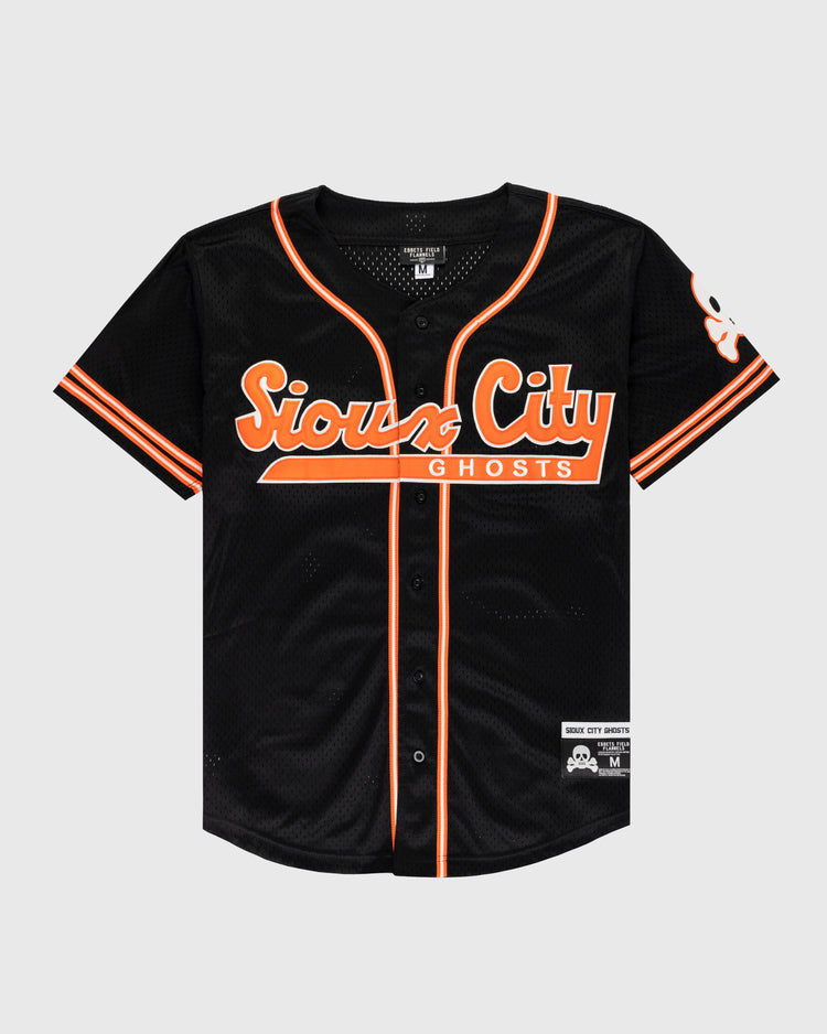 The EFF Sioux City Ghosts Mesh Button-Up Jersey features black fabric with orange and white trim, Sioux City Ghosts across the chest, a ghost patch on the left sleeve, and size medium label—honoring the legendary barnstorming softball team.