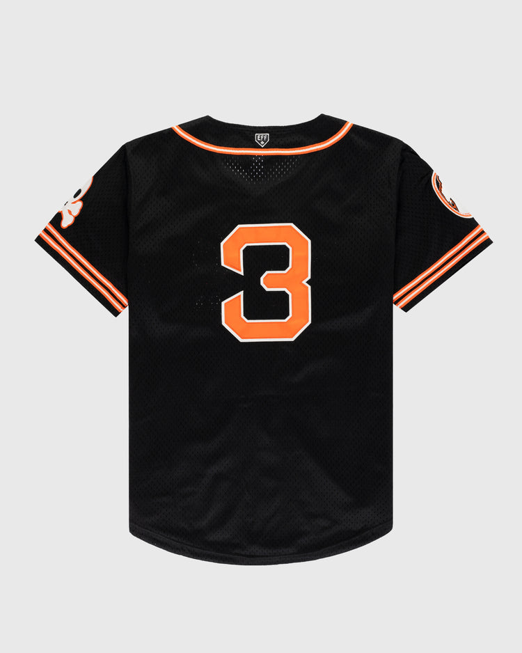 The Sioux City Ghosts Mesh Button-Up Jersey by EFF features orange and white striped cuffs and collar, a bold orange-and-white number 3 on the back, and sleeve patches—channeling classic barnstorming softball team style.