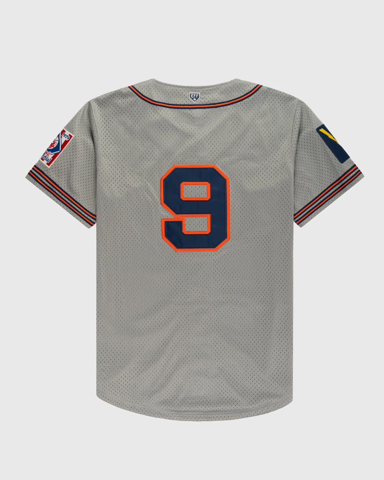 A grey New York Knights Mesh Button-Up Baseball Jersey by EFF, shown from the back with a large navy and orange number 9. Red and blue striped sleeves feature patches, echoing the style worn by Robert Redford in The Natural.
