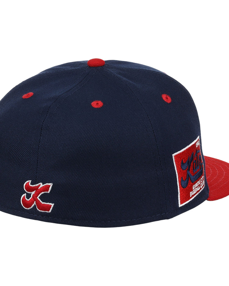 The Kansas City Katz EFF DNA Fitted Ballcap by EFF is a vintage-inspired navy cap with a red brim, button, and eyelets, plus embroidered KC and Katz patches featuring Keith in red script.